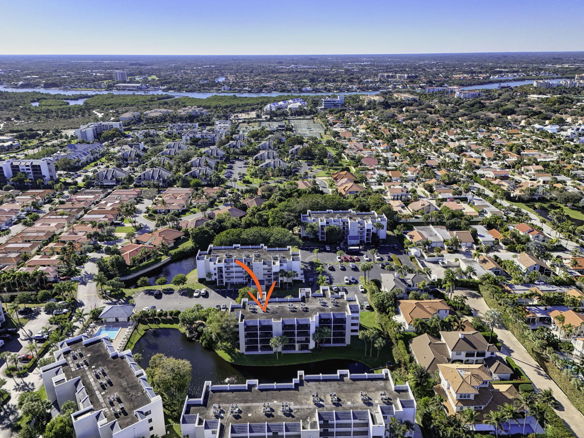 1605 Highway 1, Unit D105 Jupiter, FL 33477 - Photo 60 of 69 an aerial view of a city with lots of residential buildings