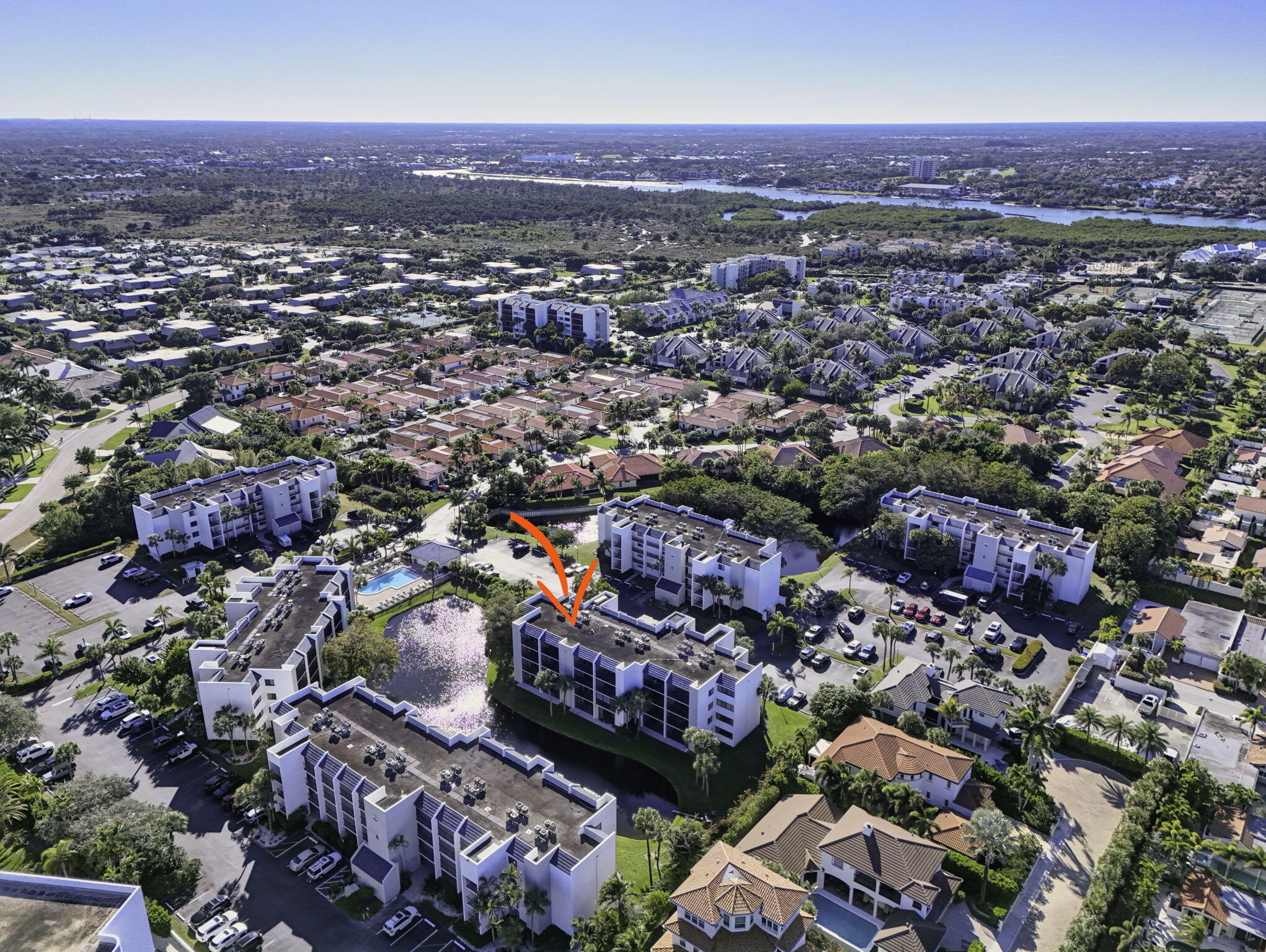 1605 Highway 1, Unit D105 Jupiter, FL 33477 - Photo 61 of 69 an aerial view of a city with lots of residential buildings