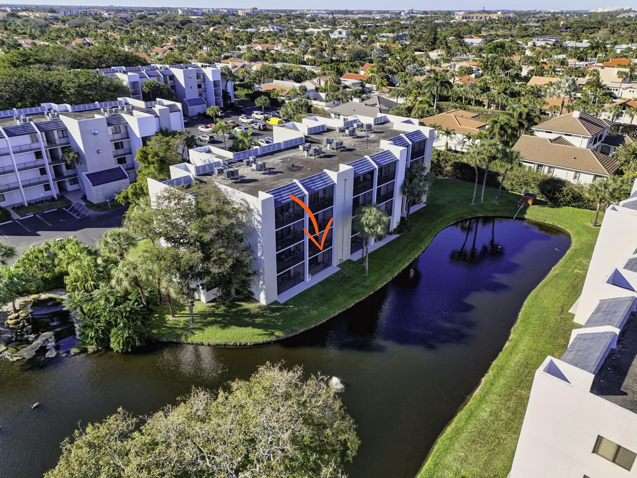 1605 Highway 1, Unit D105 Jupiter, FL 33477 - Photo 66 of 69 an aerial view of a house with a garden lake view