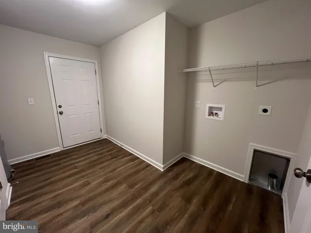 a view of small space with racks on the wall