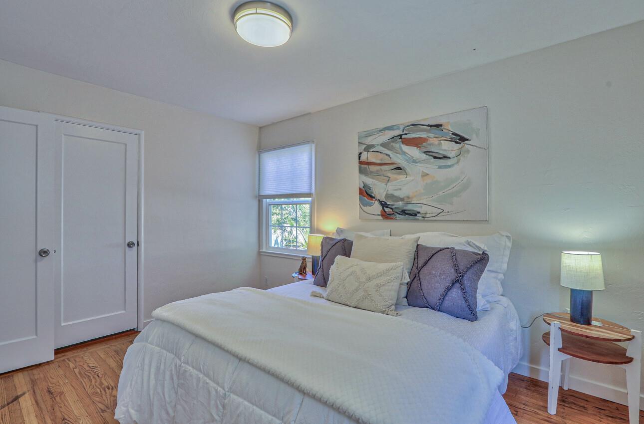 1815 King Street Santa Cruz, CA 95060 - Photo 19 of 36 a bedroom with a bed and a window
