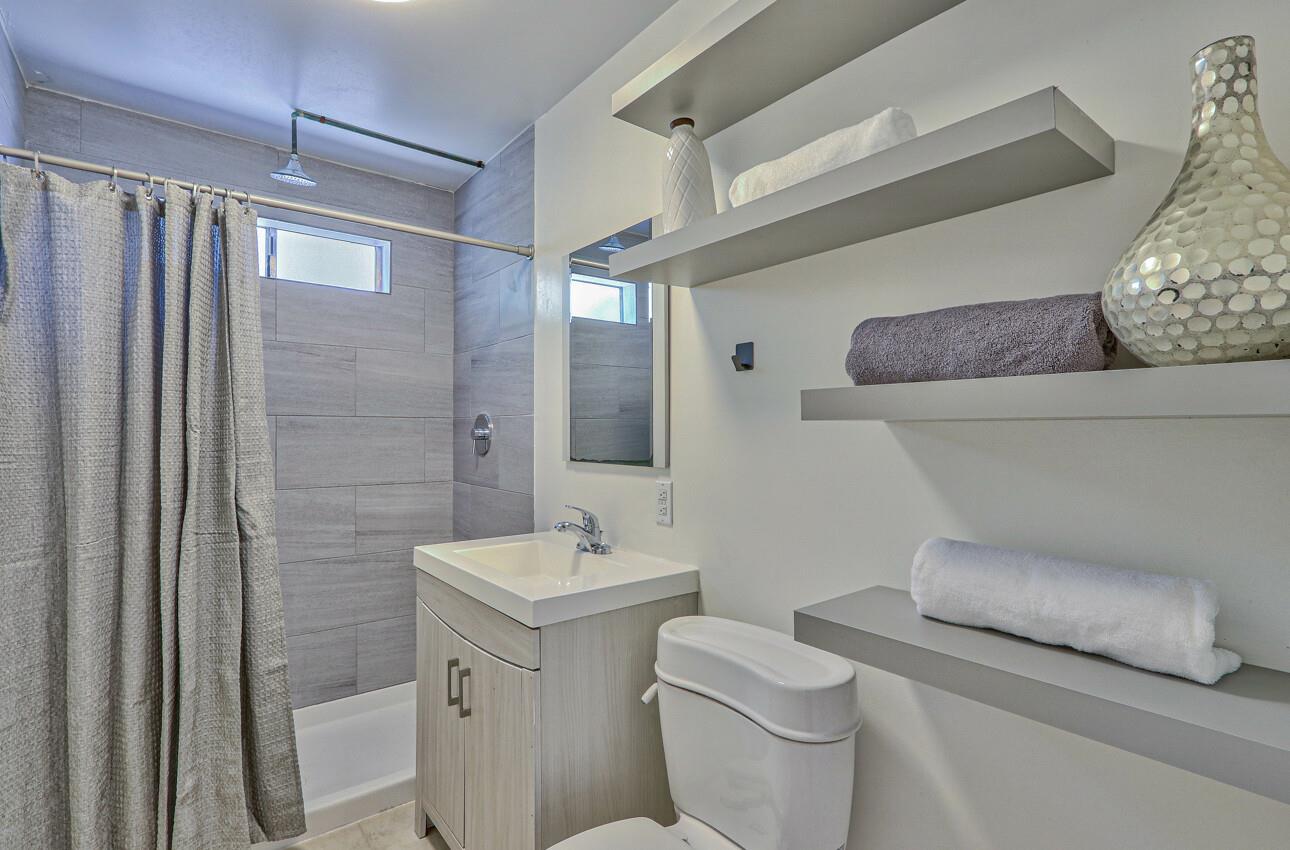 1815 King Street Santa Cruz, CA 95060 - Photo 20 of 36 a bathroom with a toilet sink and shower