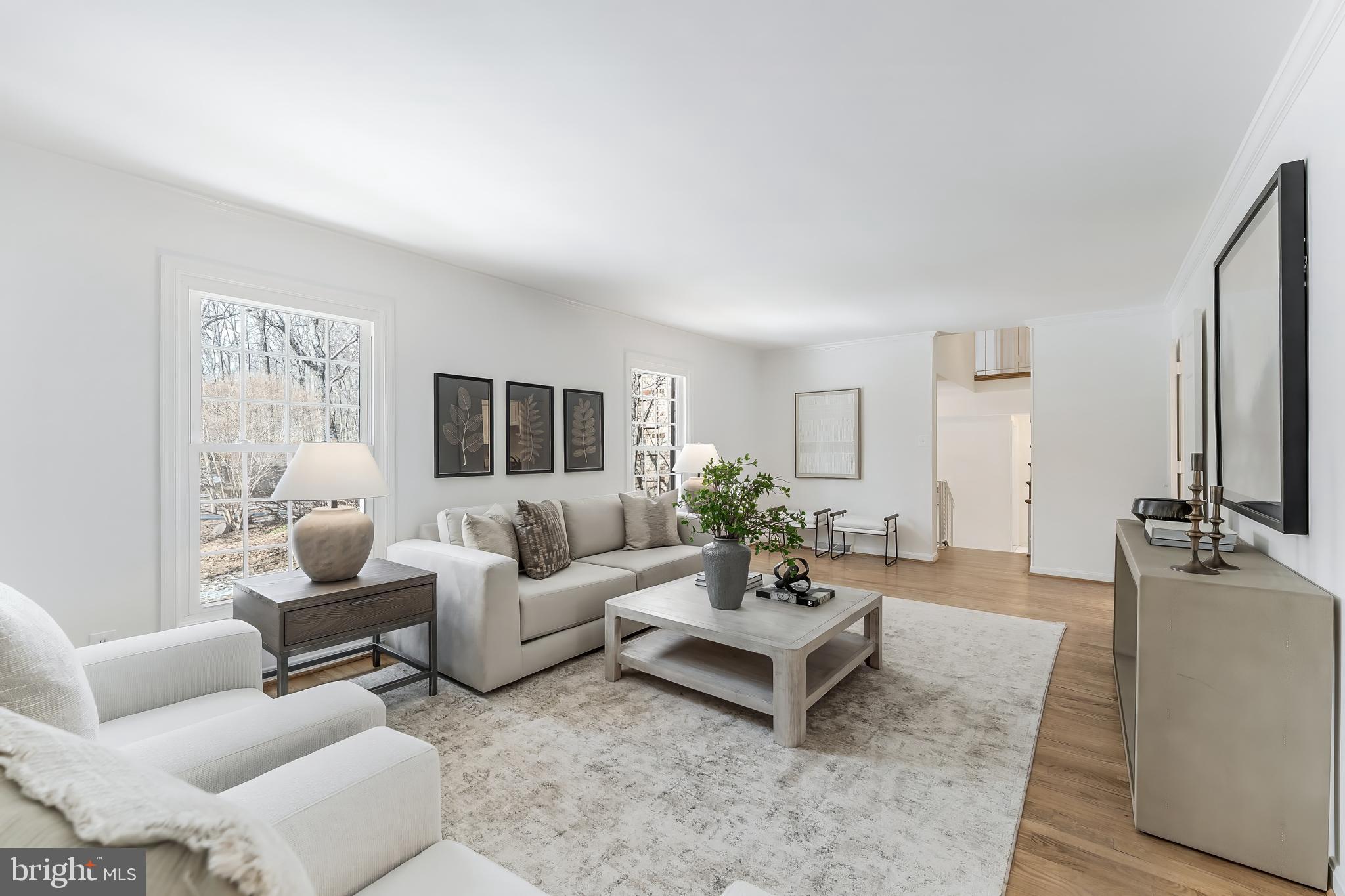 2615 Steeplechase Drive Reston, VA 20191 - Photo 15 of 79 a living room with furniture and a flat screen tv