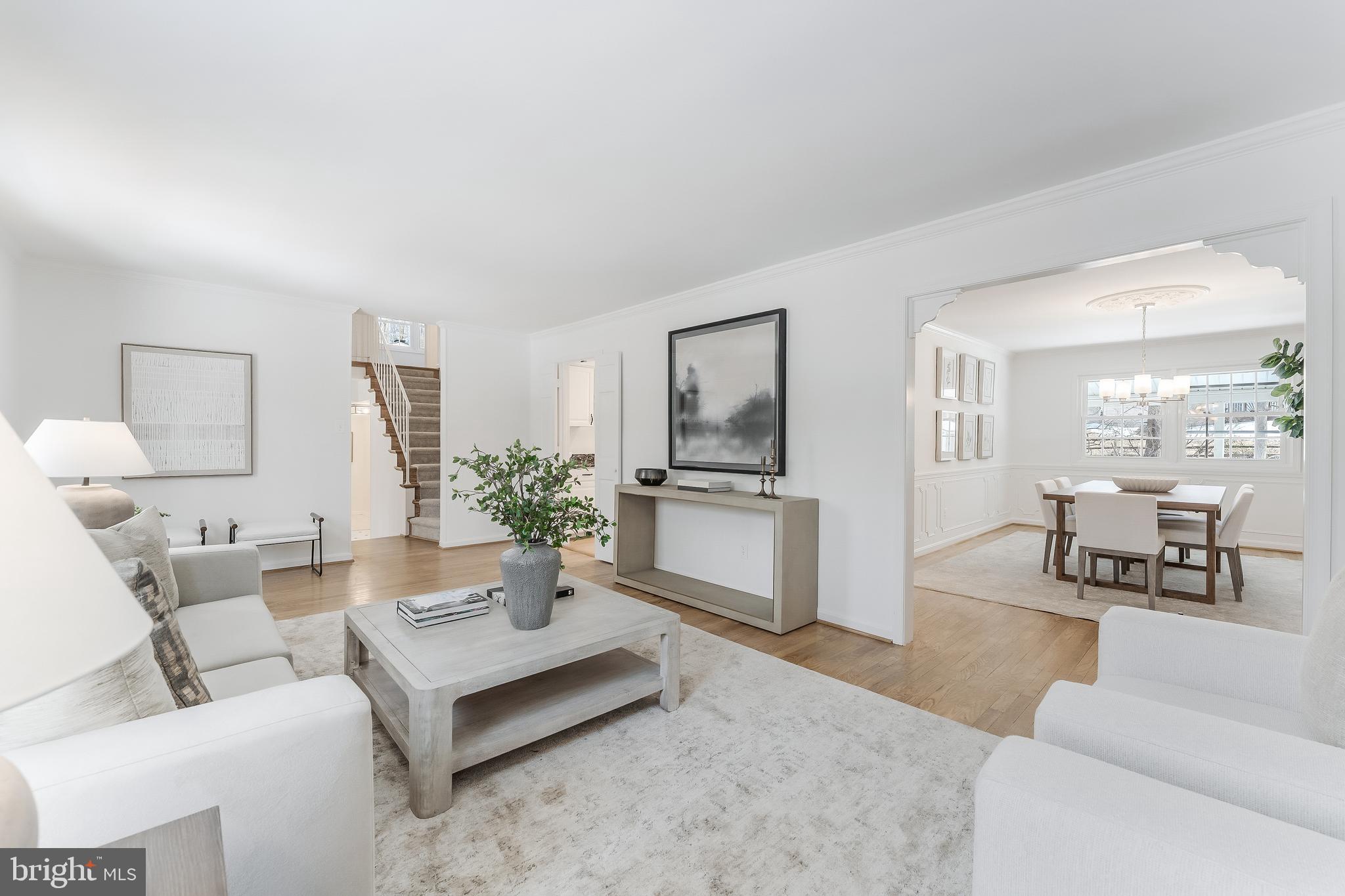 2615 Steeplechase Drive Reston, VA 20191 - Photo 16 of 79 a living room with furniture and a large mirror with wooden floor