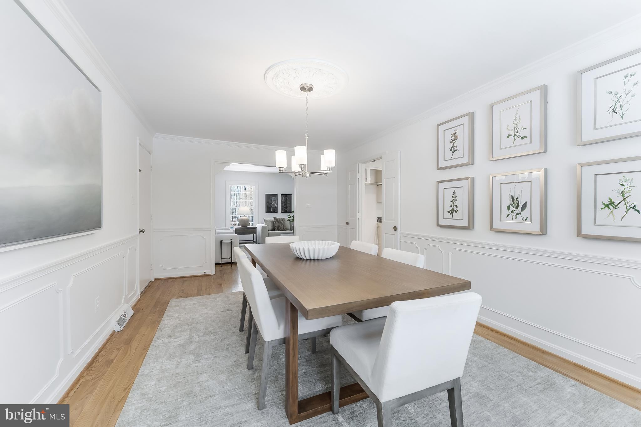 2615 Steeplechase Drive Reston, VA 20191 - Photo 19 of 79 a view of a dining room with furniture and wooden floor
