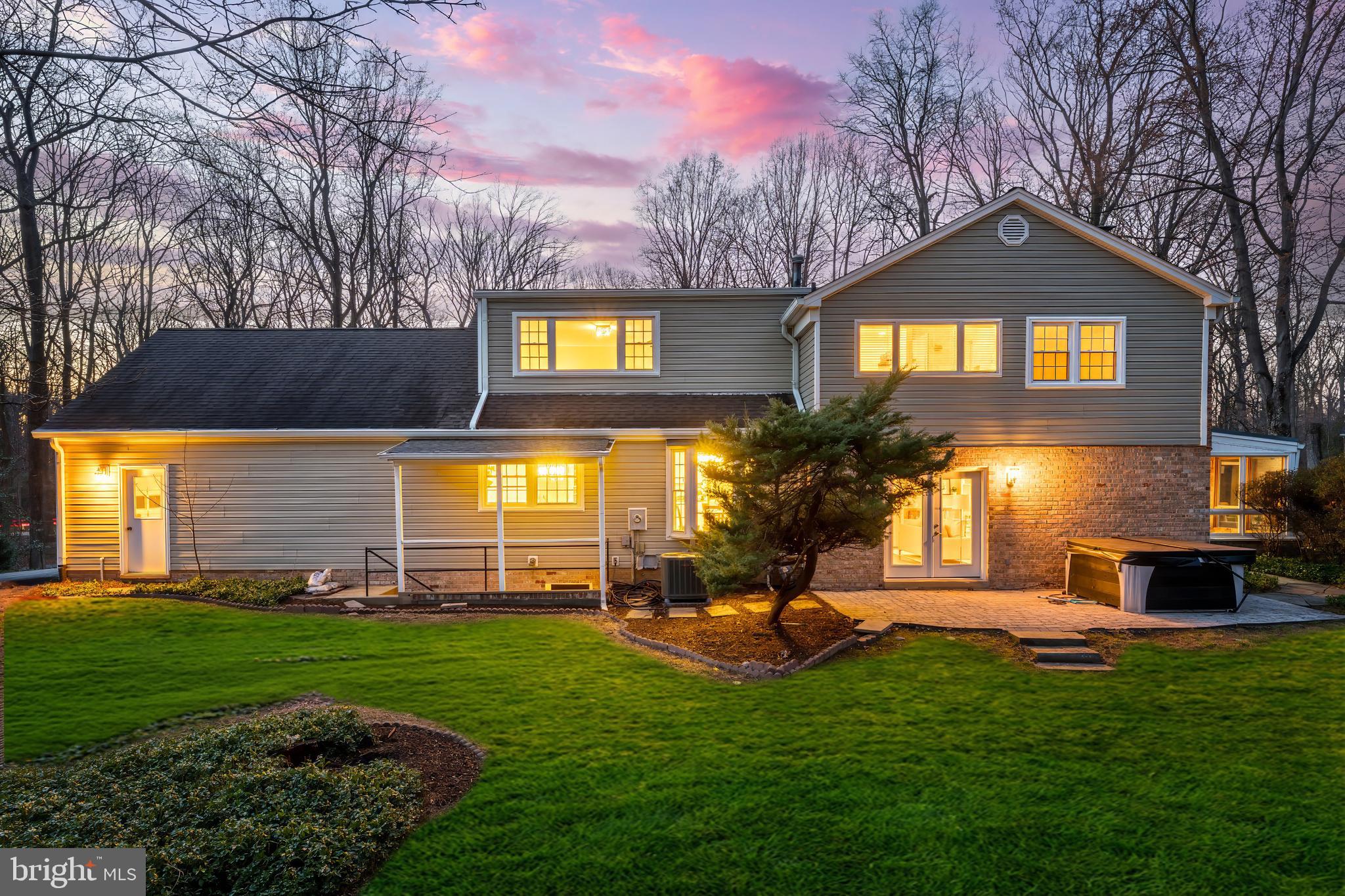 2615 Steeplechase Drive Reston, VA 20191 - Photo 2 of 79 a front view of a house with a yard