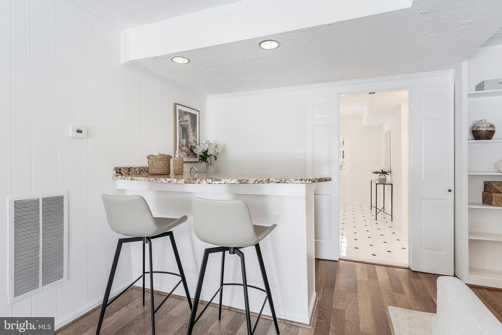 2615 Steeplechase Drive Reston, VA 20191 - Photo 28 of 79 a dining room with furniture and wooden floor