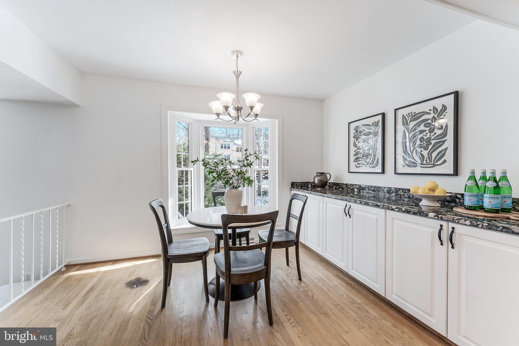 2615 Steeplechase Drive Reston, VA 20191 - Photo 31 of 79 a view of a dining room with furniture window and wooden floor