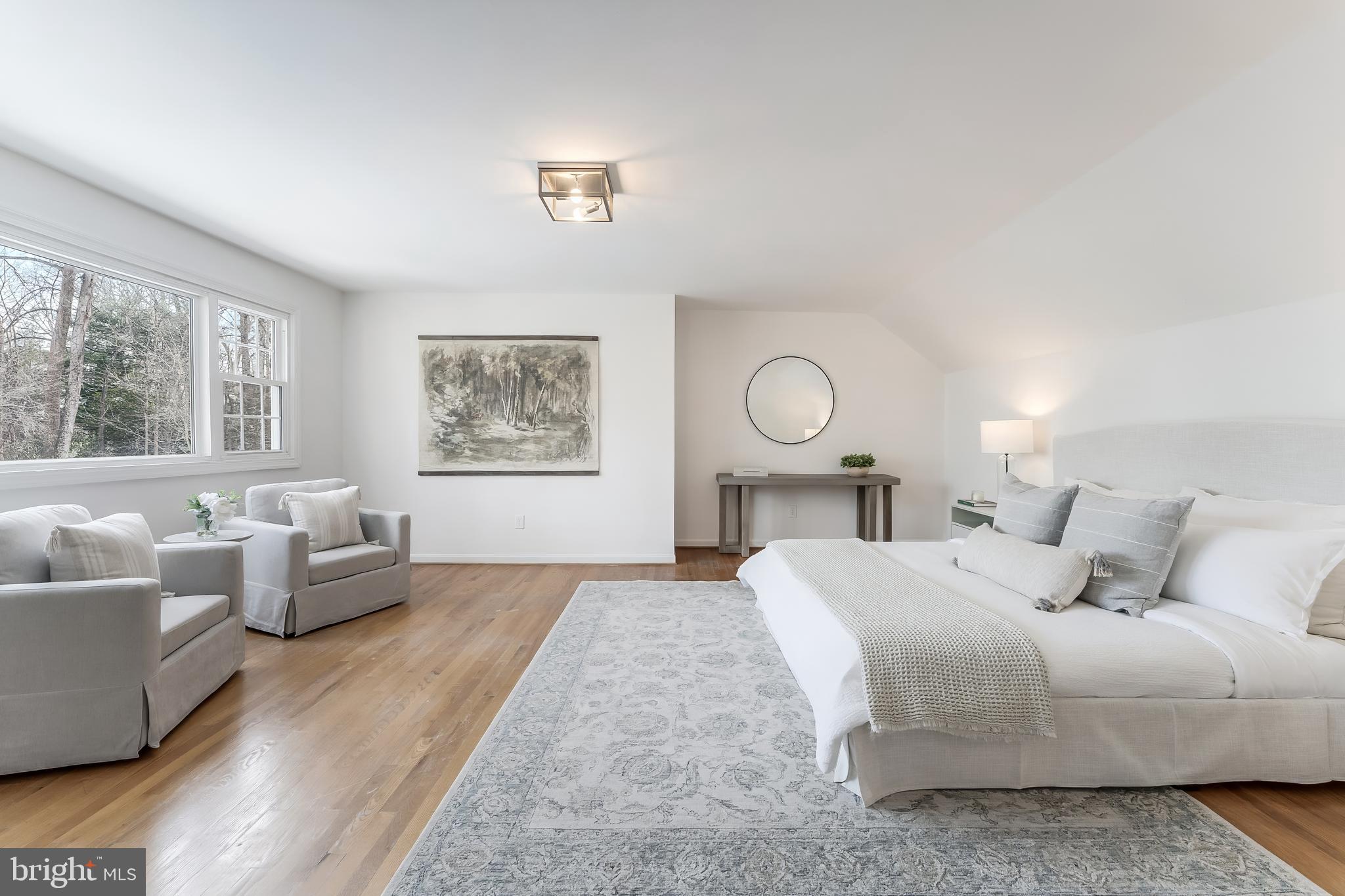 2615 Steeplechase Drive Reston, VA 20191 - Photo 39 of 79 a bedroom with a large bed and a couch