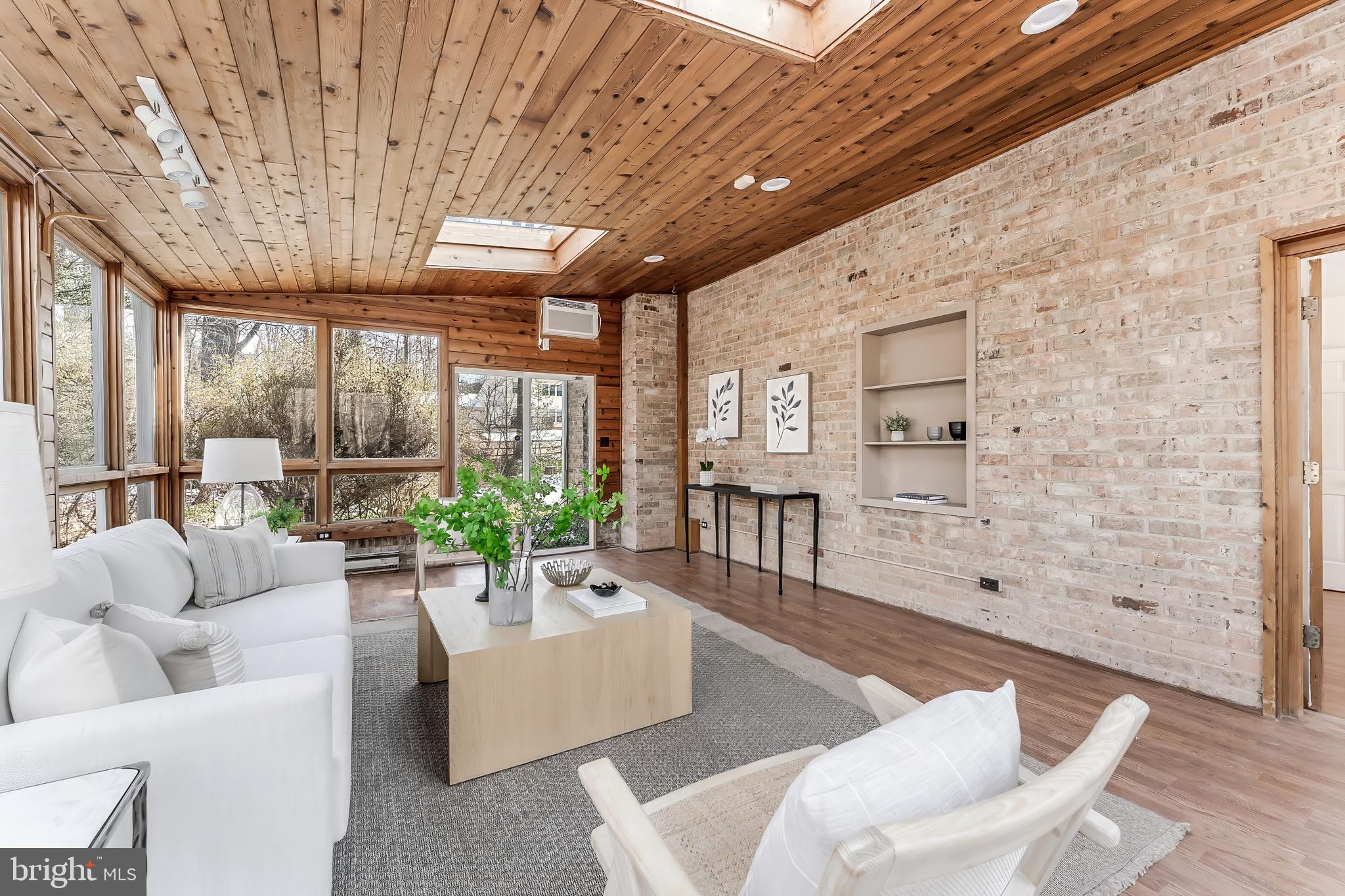 2615 Steeplechase Drive Reston, VA 20191 - Photo 4 of 79 a living room with furniture and a large window