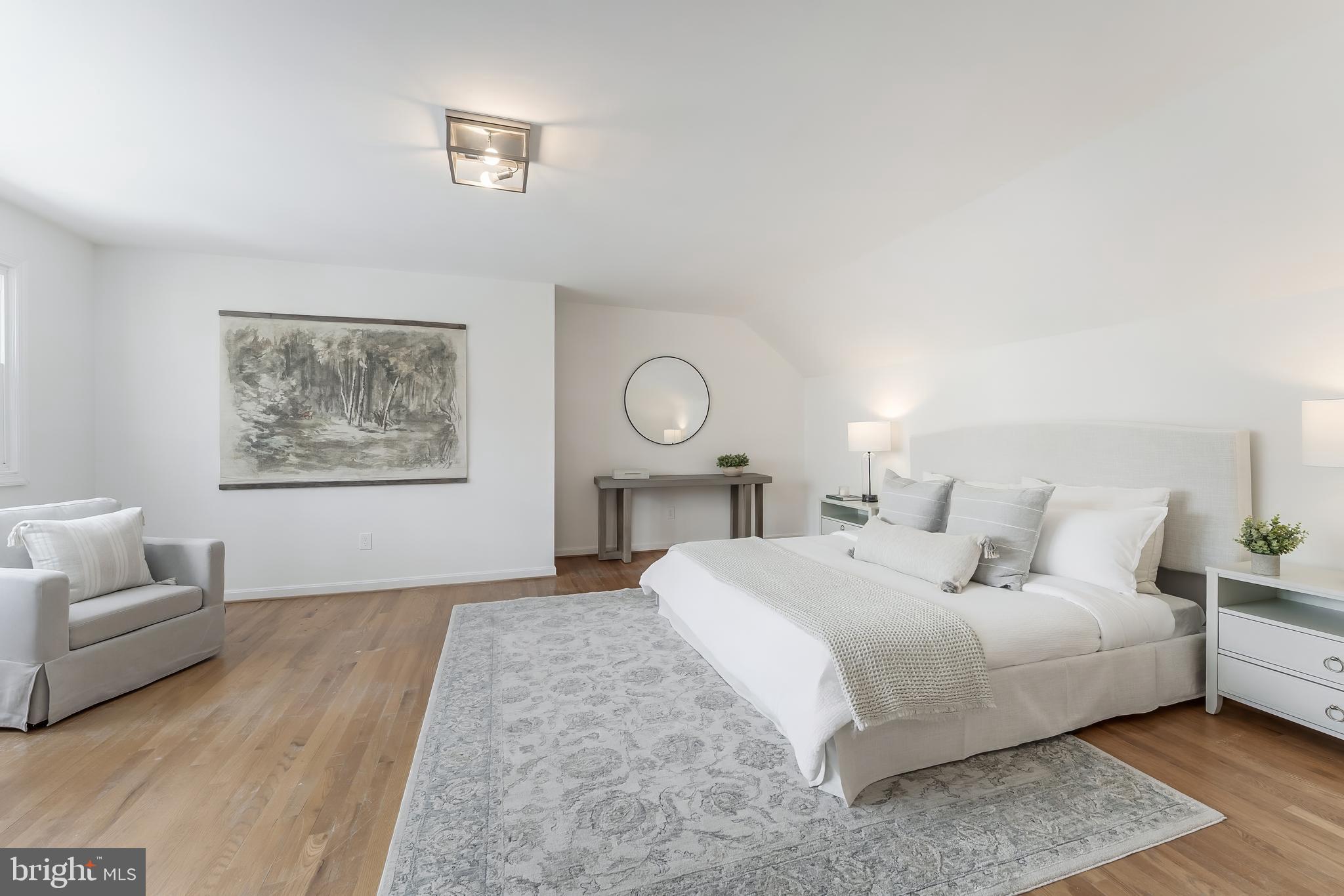 2615 Steeplechase Drive Reston, VA 20191 - Photo 41 of 79 a bedroom with a large bed and a couch