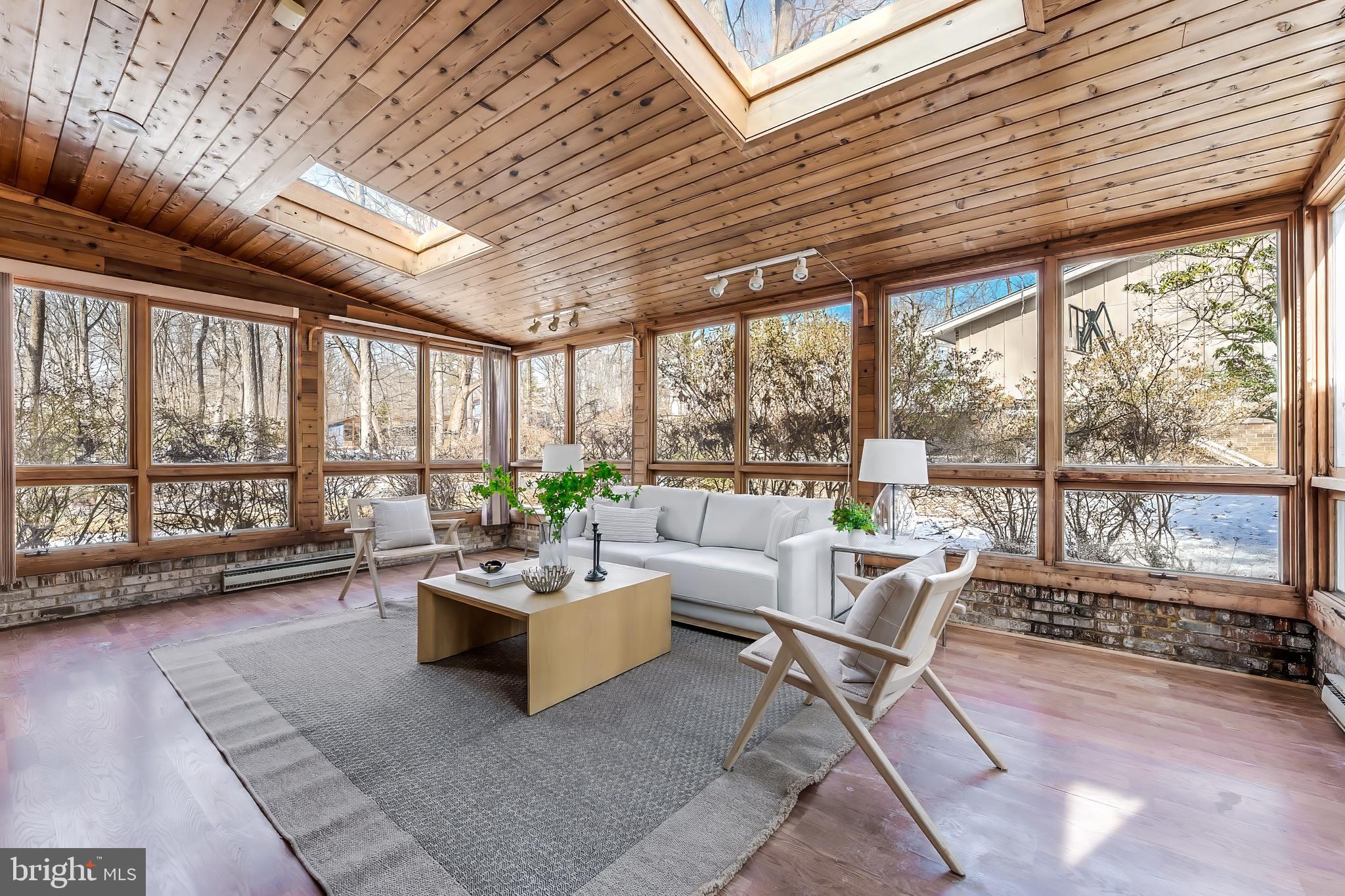 2615 Steeplechase Drive Reston, VA 20191 - Photo 5 of 79 a living room with furniture and a flat screen tv