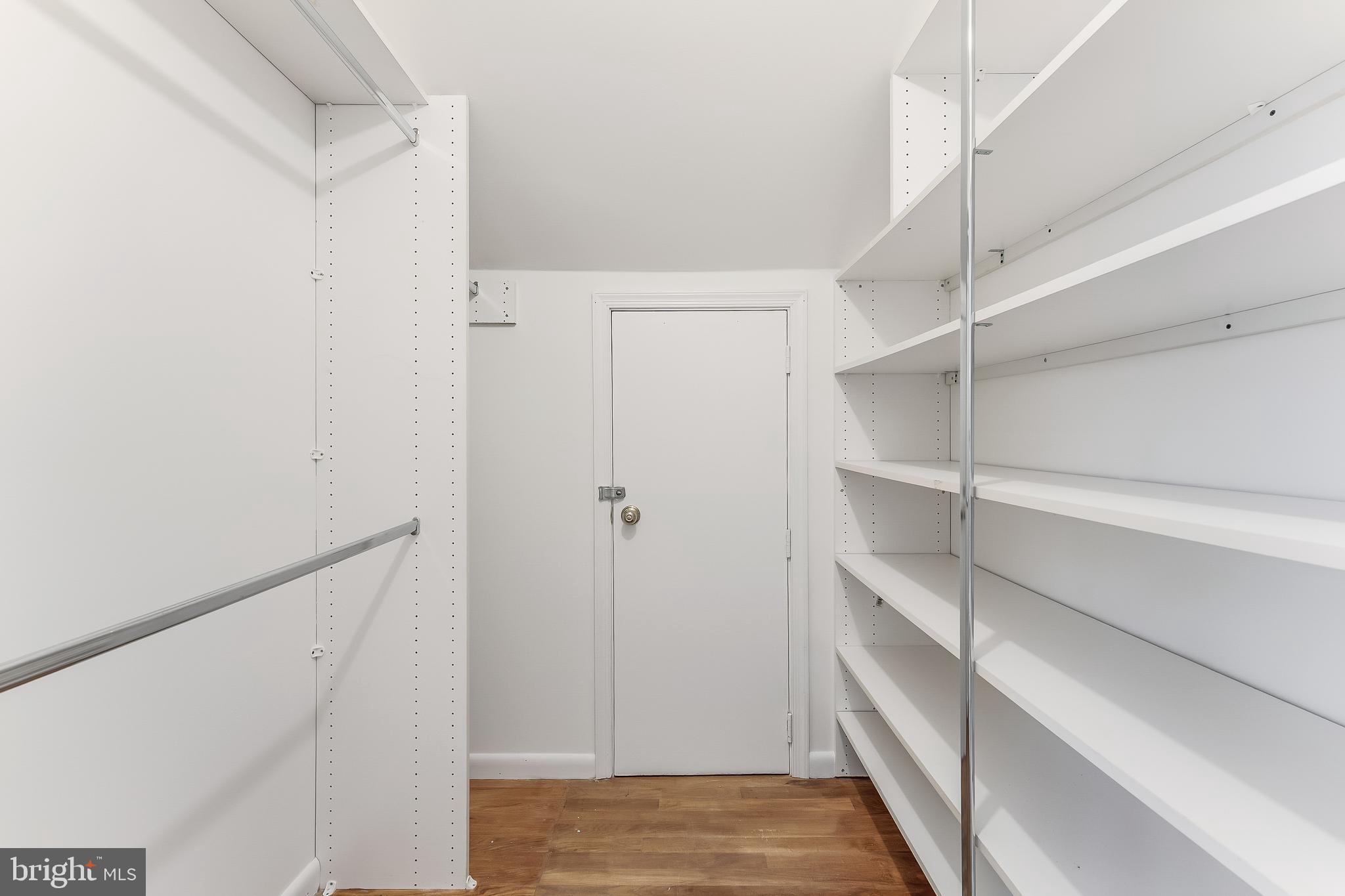 2615 Steeplechase Drive Reston, VA 20191 - Photo 54 of 79 a view of walk in closet with empty racks