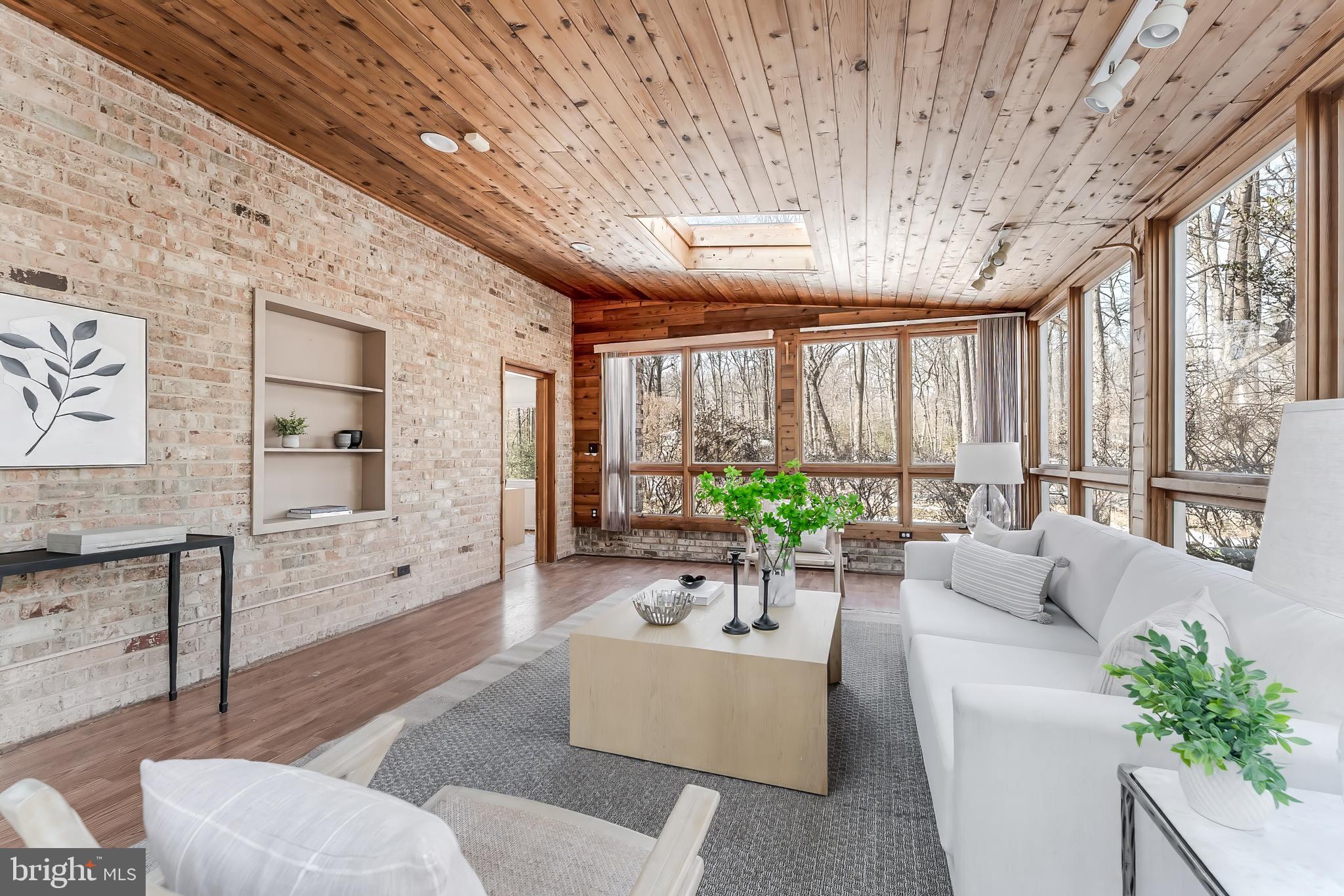 2615 Steeplechase Drive Reston, VA 20191 - Photo 6 of 79 a living room with furniture and large windows