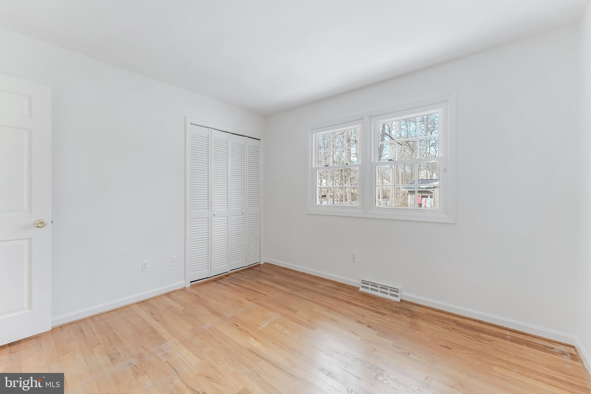 2615 Steeplechase Drive Reston, VA 20191 - Photo 66 of 79 a view of empty room with wooden floor and fan