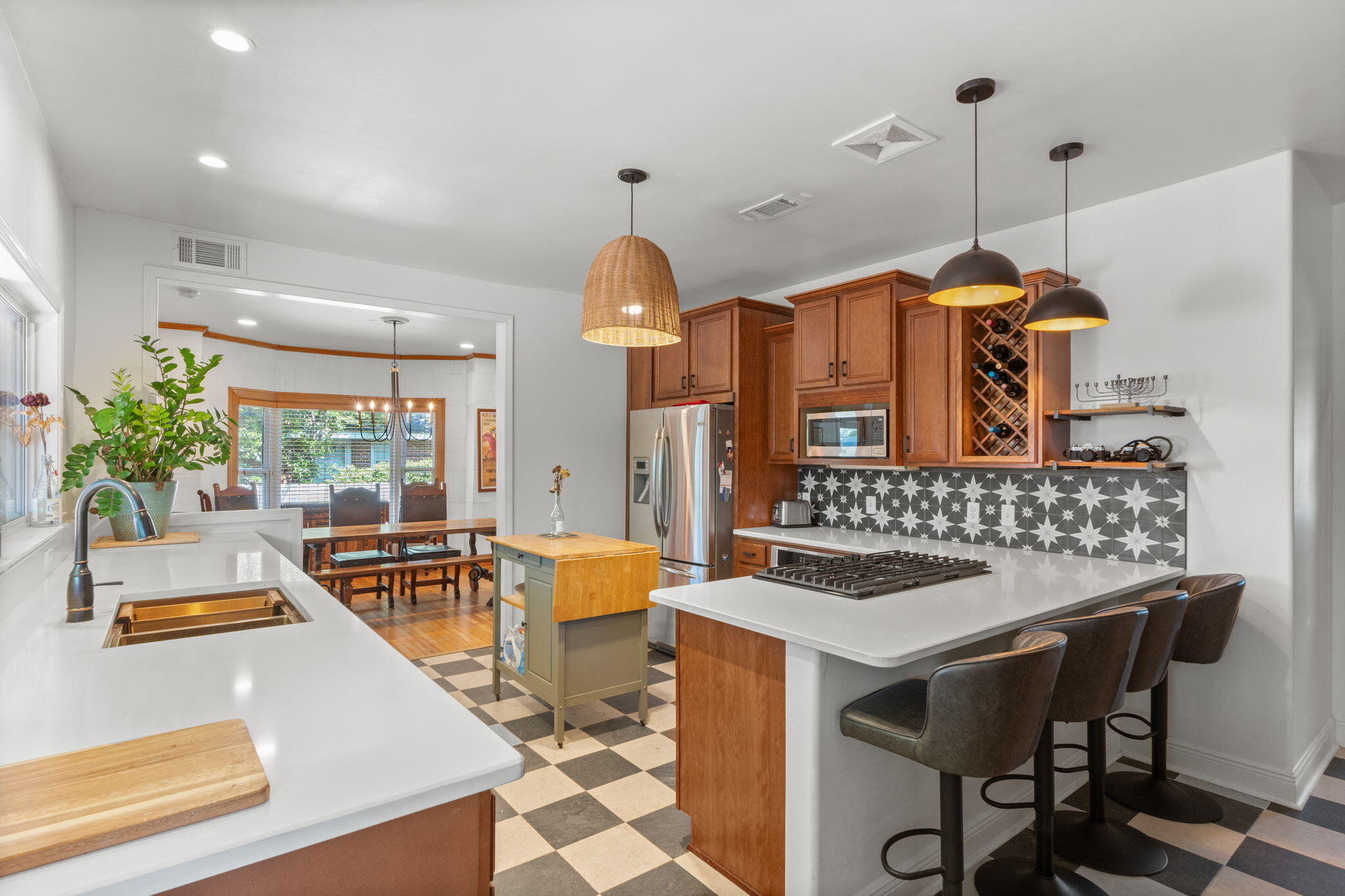 2016 East Scott Street Pensacola, FL 32503 - Photo 13 of 26 a kitchen that has a table and chairs in it