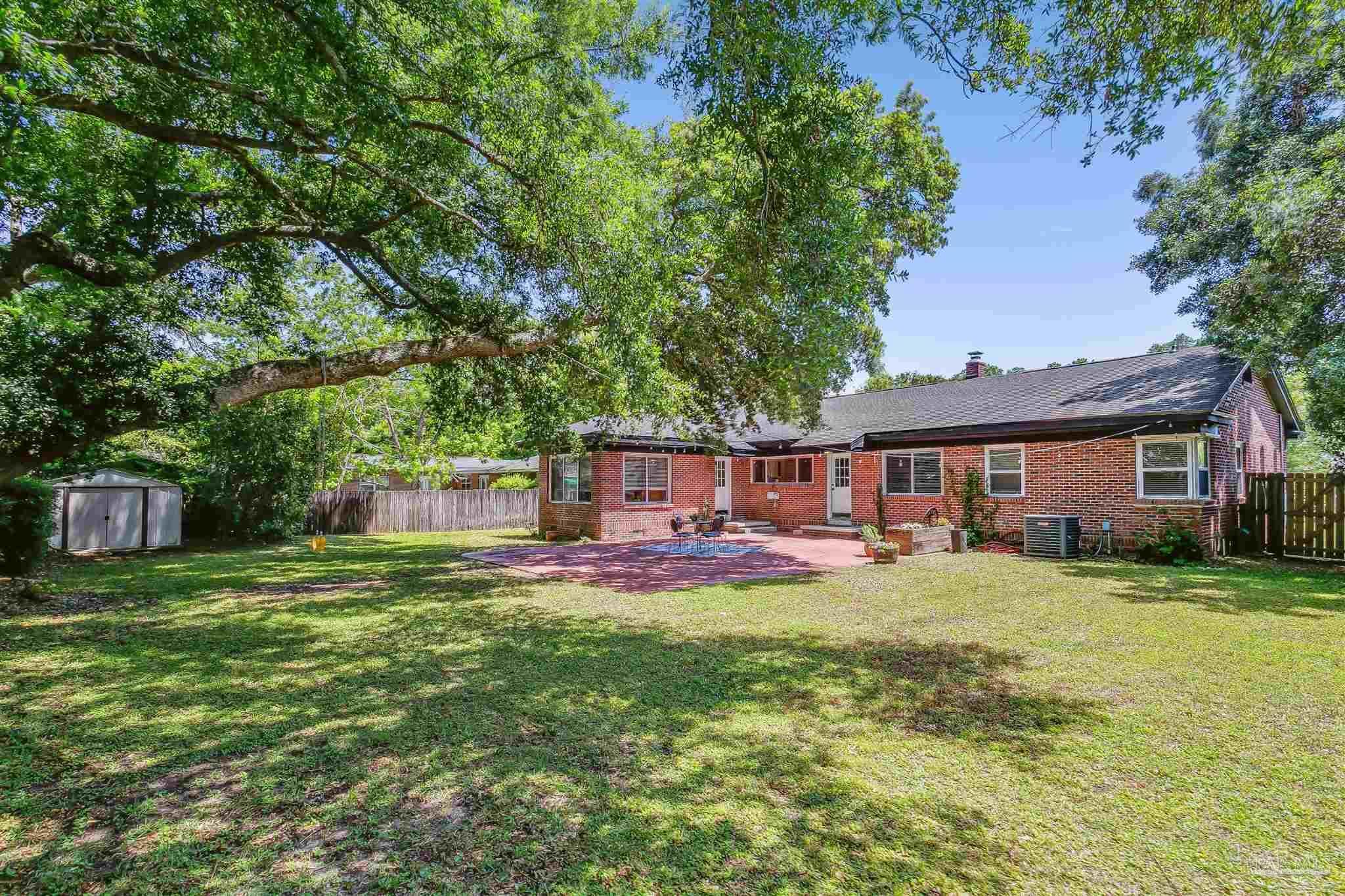2016 East Scott Street Pensacola, FL 32503 - Photo 24 of 26 a house view with a sitting space and garden
