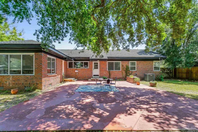 a front view of a house with patio