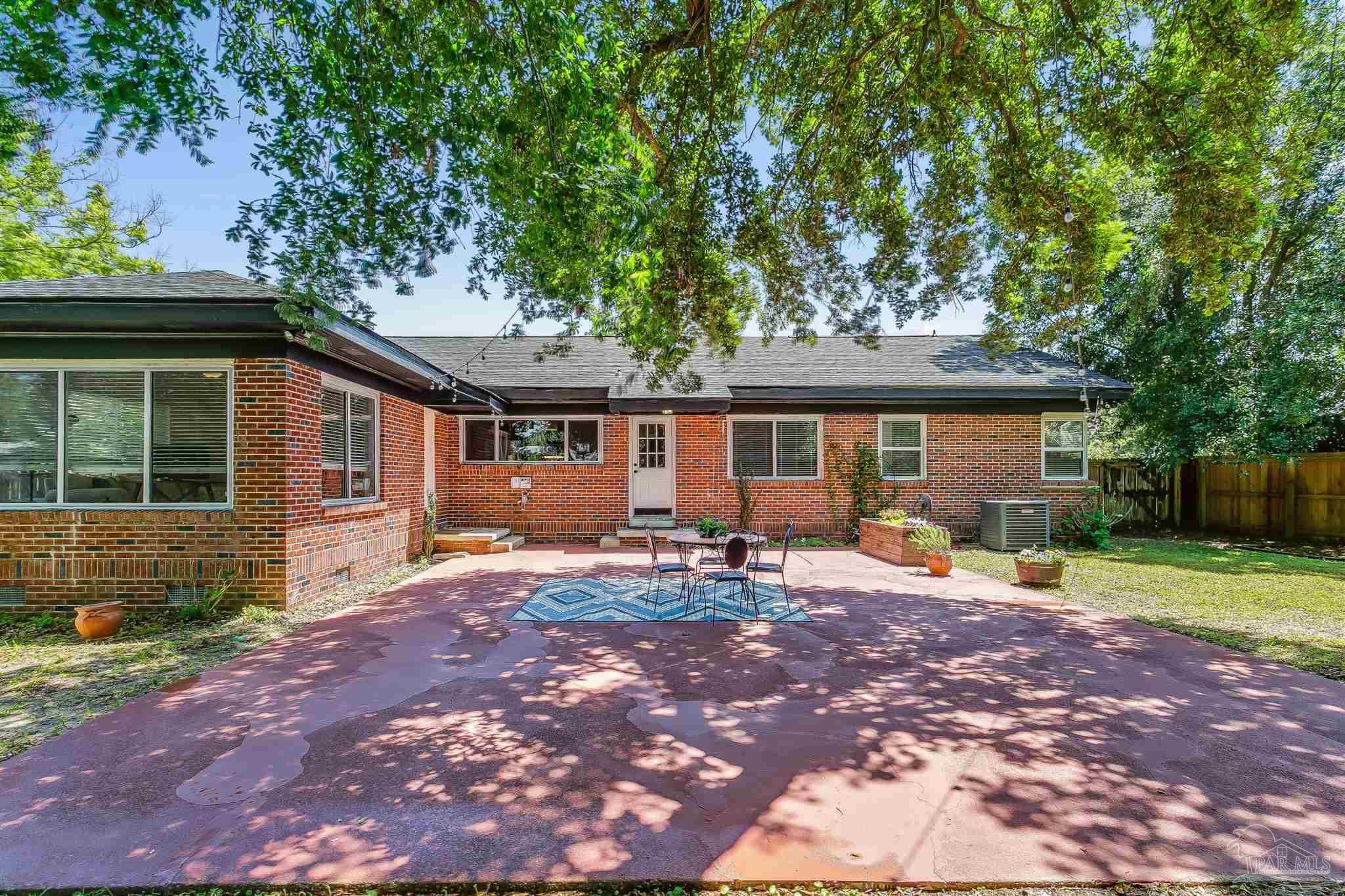 2016 East Scott Street Pensacola, FL 32503 - Photo 25 of 26 a front view of a house with patio