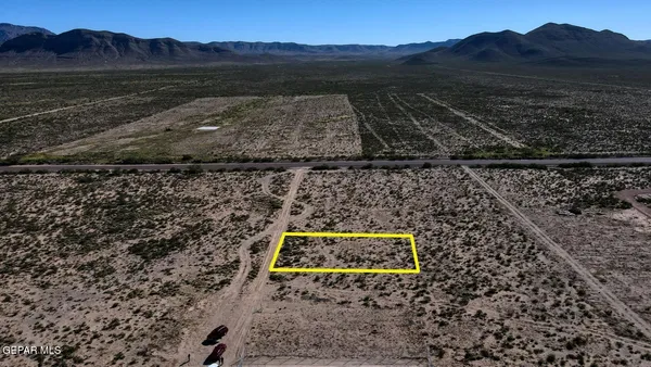 a view of a backyard with a garden