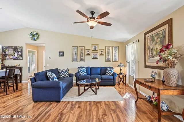 a kitchen with sink refrigerator and stove