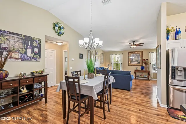 a bedroom with bed and a window