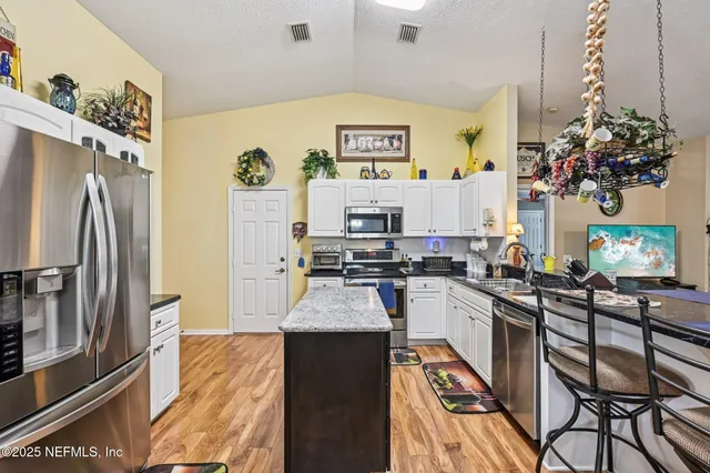 a bathroom with a toilet and shower