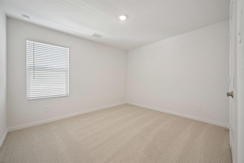 1705 Arches Road Anna, TX 75409 - Photo 28 of 33 an empty room with a window