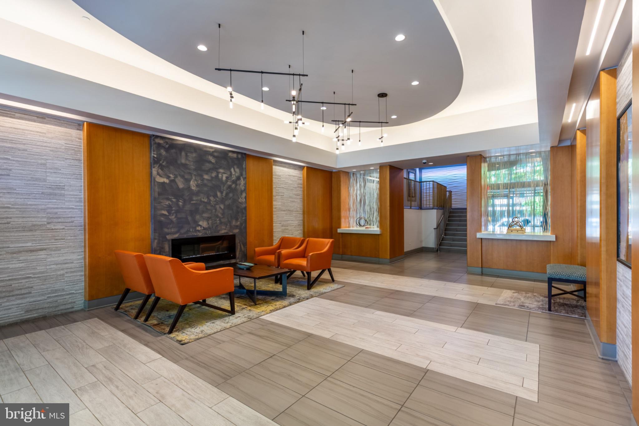 350 G Street Southwest, Unit N423 Washington, DC 20024 - Photo 3 of 43 Modern elegance in a welcoming lobby.