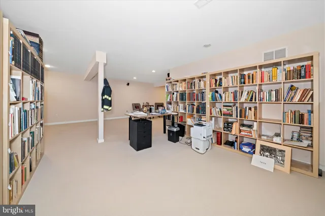 a house view with swimming pool in front of it