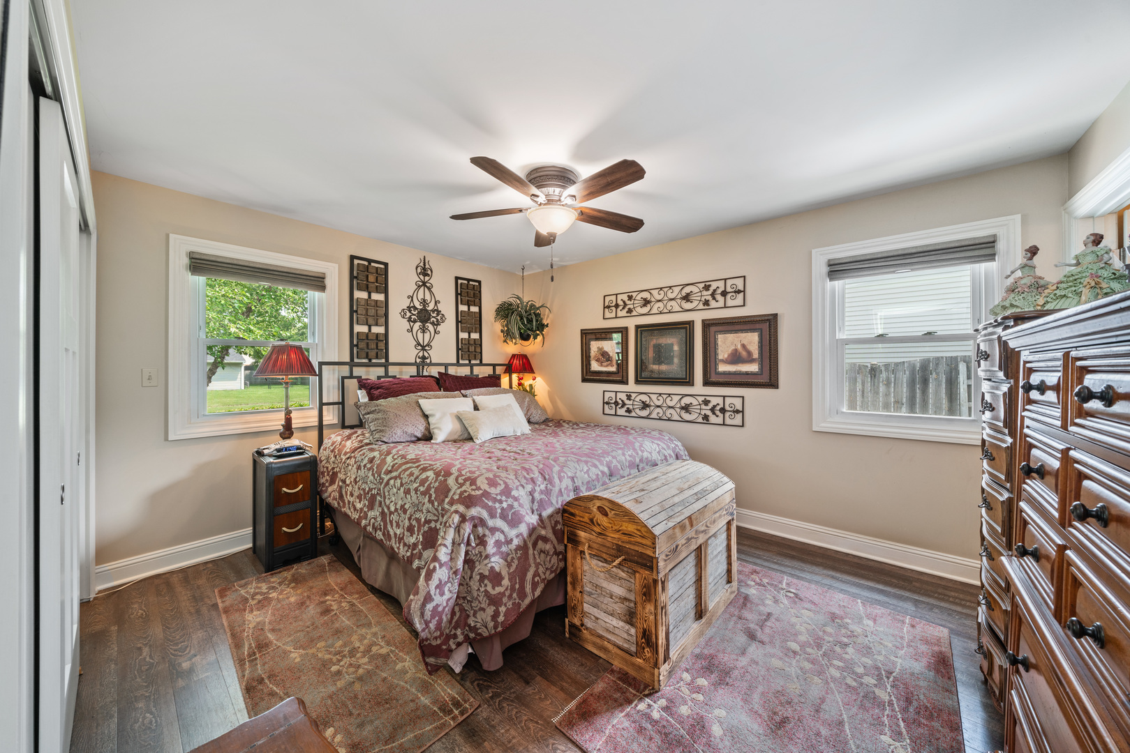 51 Winrock Road Montgomery, IL 60538 - Photo 10 of 26 a bed room with a bed and a chandelier