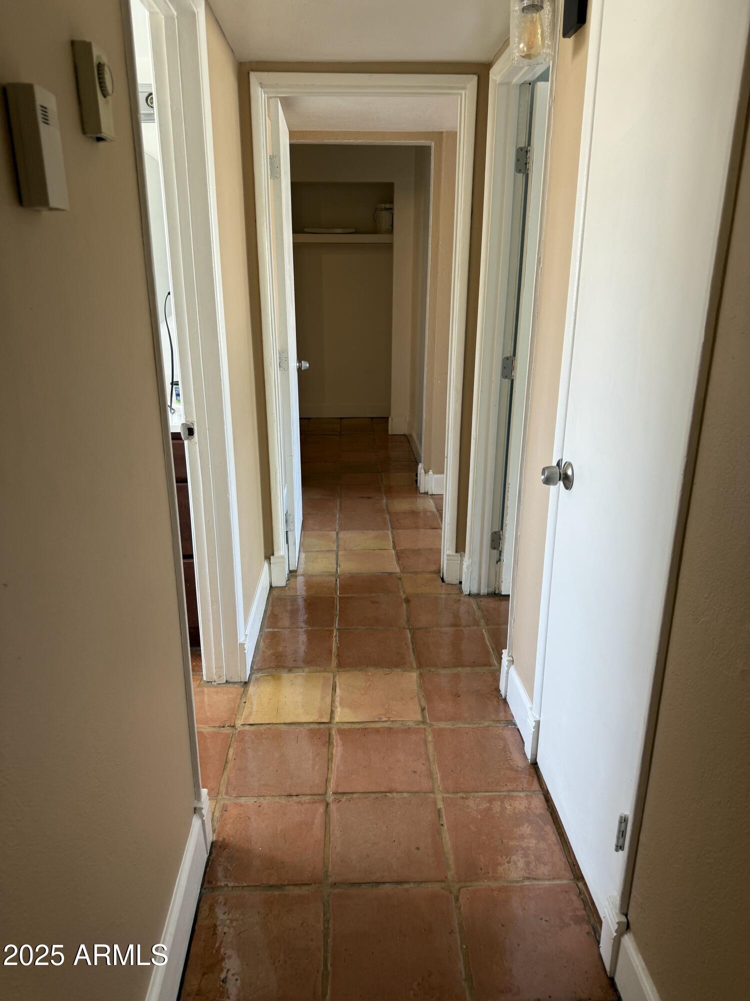349 East Thomas Road, Unit E207 Phoenix, AZ 85004 - Photo 6 of 13 a view of a hallway