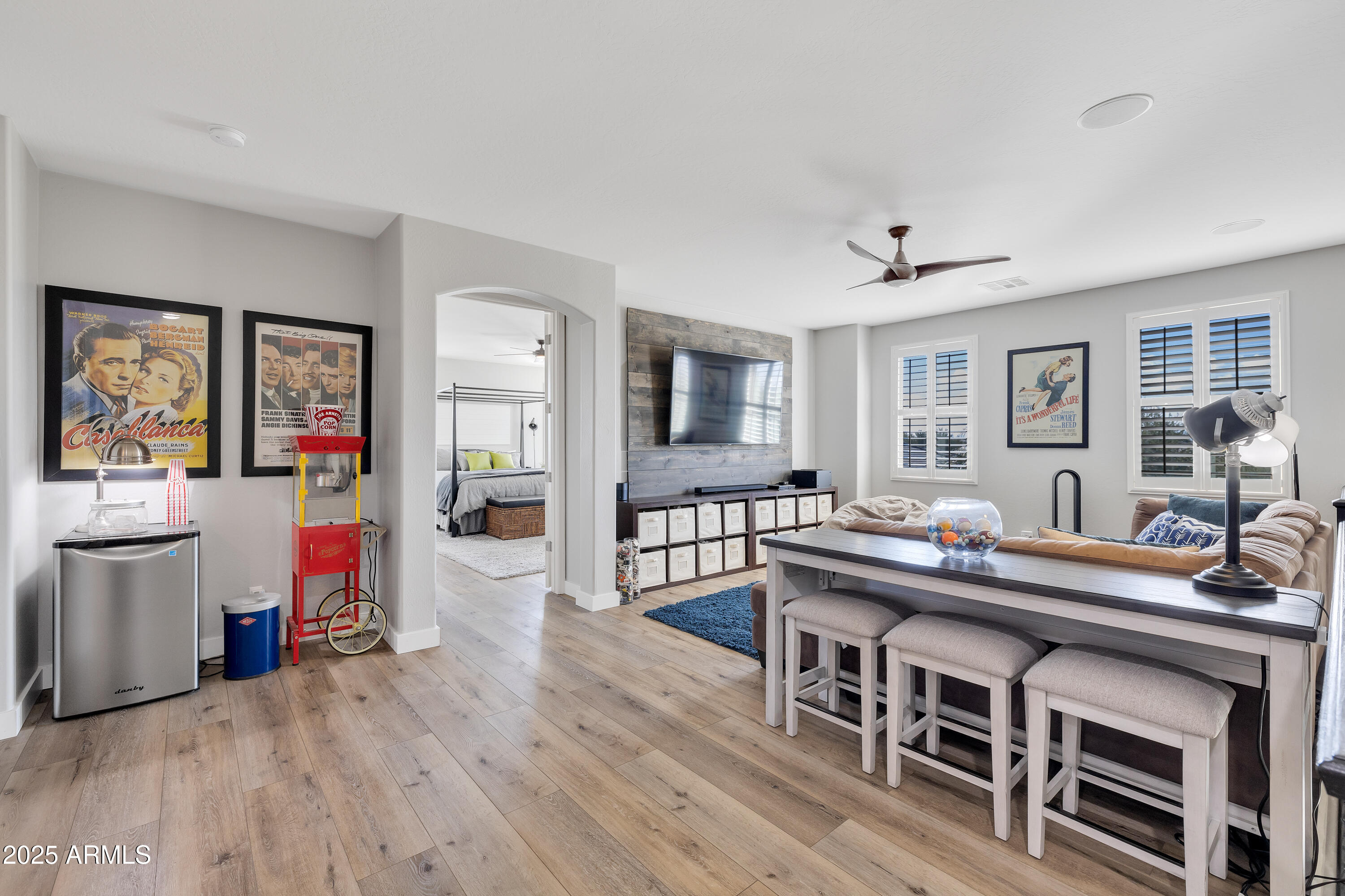 16896 North Palo Rojo Road Maricopa, AZ 85138 - Photo 19 of 48 a view of a dining room with furniture and wooden floor