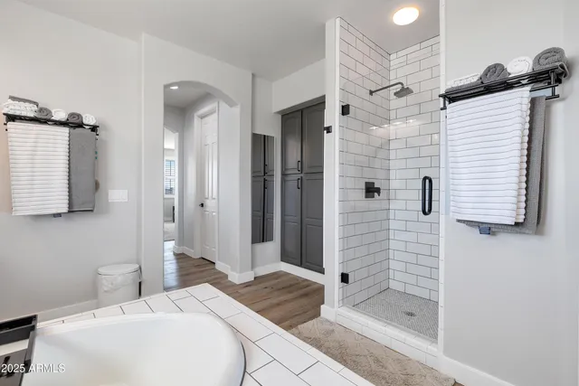 a bathroom with a sink and shower