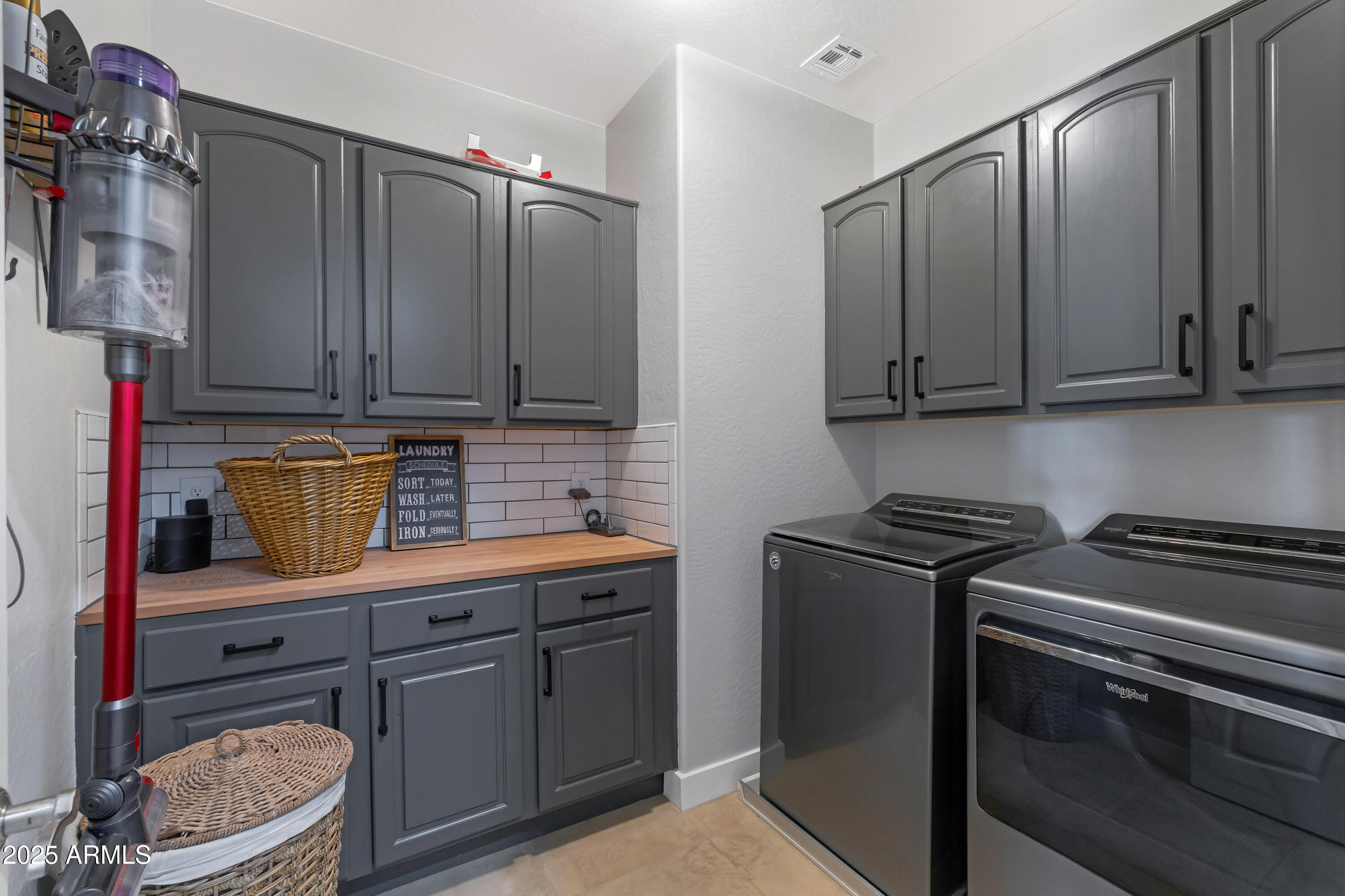 16896 North Palo Rojo Road Maricopa, AZ 85138 - Photo 30 of 48 a kitchen with stainless steel appliances granite countertop a sink stove and cabinets