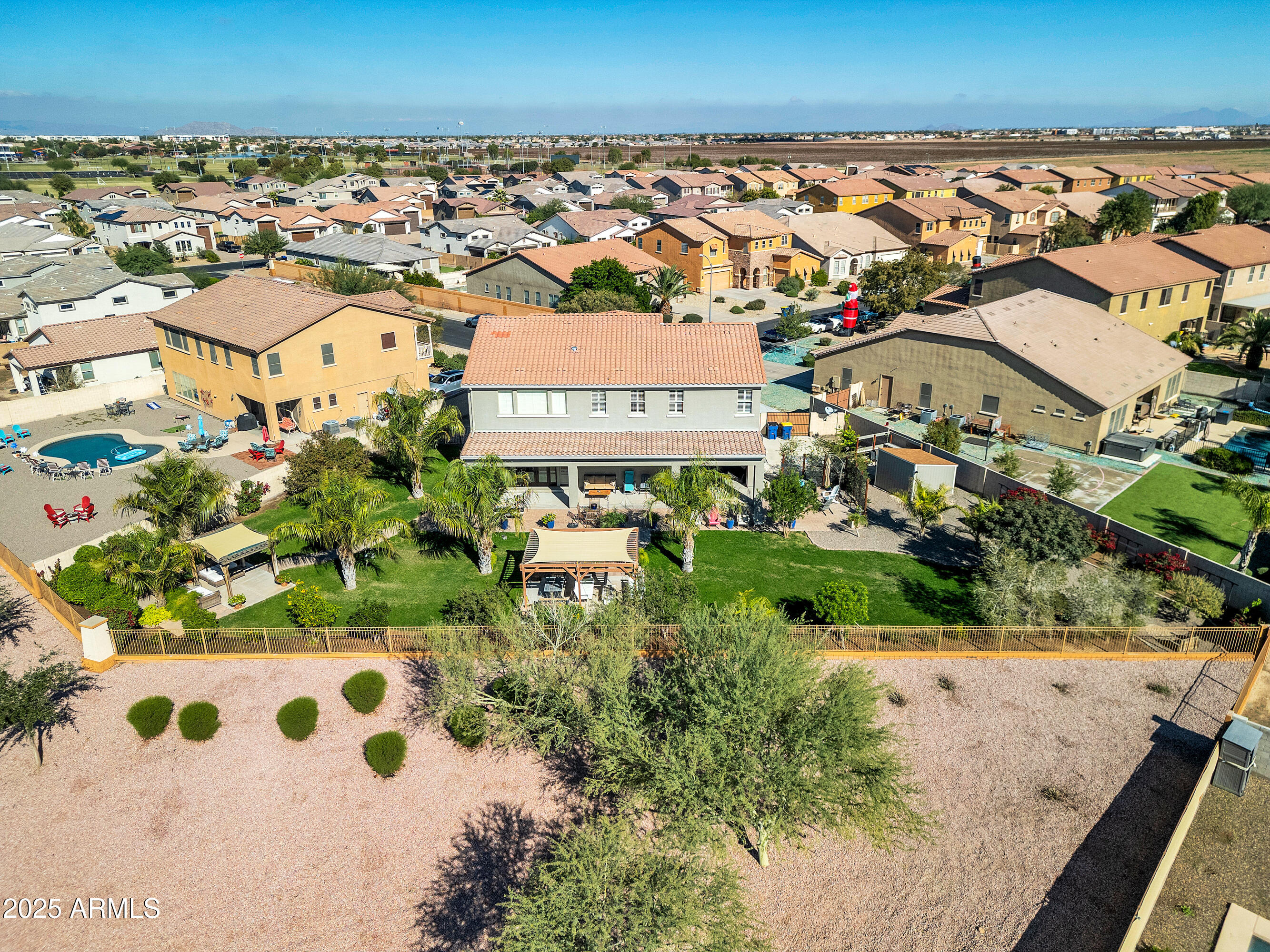 16896 North Palo Rojo Road Maricopa, AZ 85138 - Photo 43 of 48 an aerial view of residential houses with outdoor space