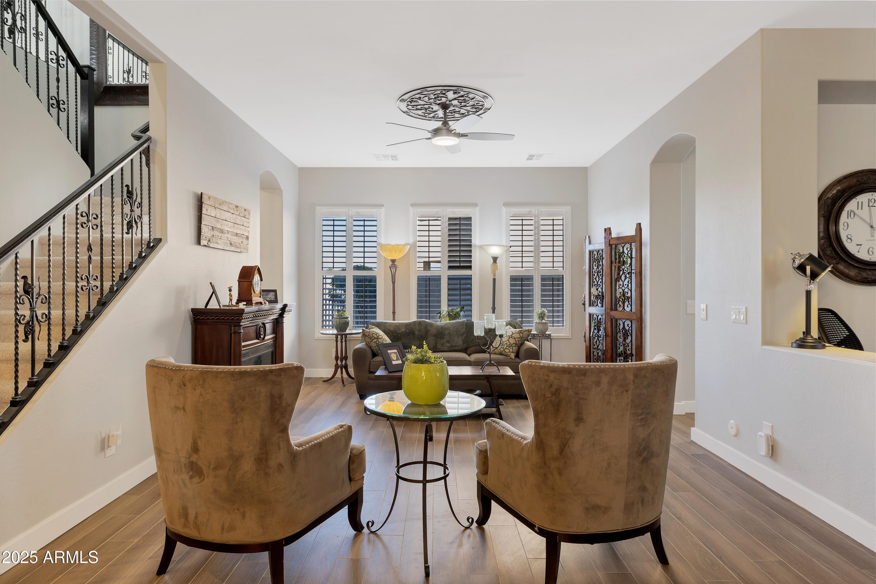 16896 North Palo Rojo Road Maricopa, AZ 85138 - Photo 5 of 48 a dining room with furniture and wooden floor