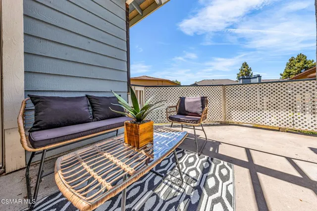 a view of a chairs in the balcony