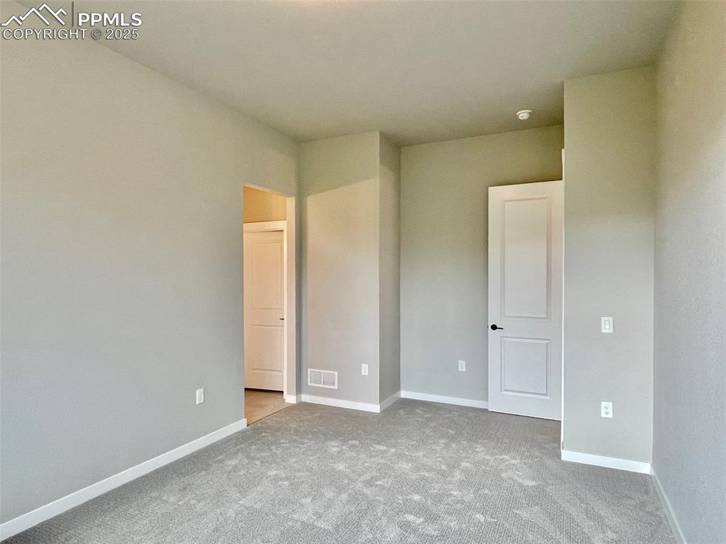 6593 Vistancia Avenue Colorado Springs, CO 80922 - Photo 12 of 21 a view of an empty room