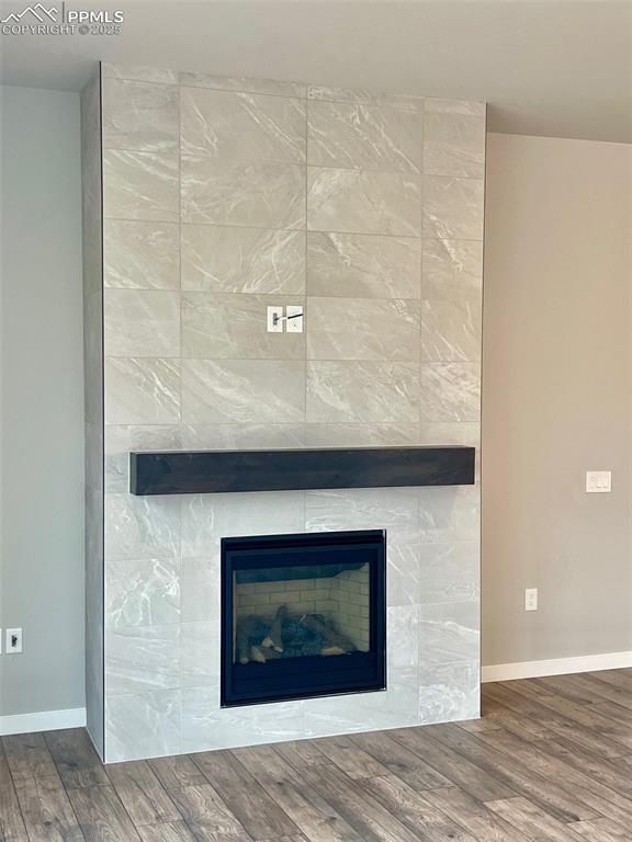 6593 Vistancia Avenue Colorado Springs, CO 80922 - Photo 7 of 21 a fireplace with a hallway