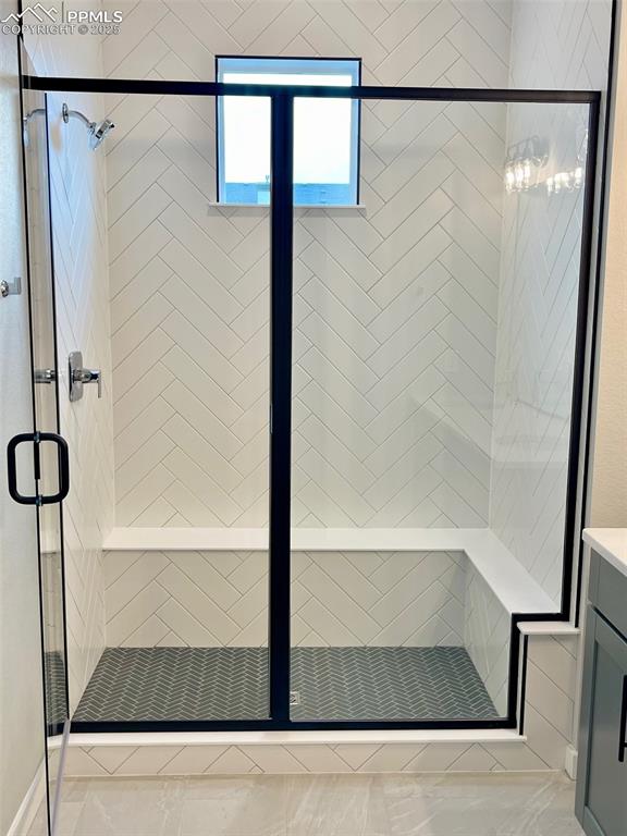 6593 Vistancia Avenue Colorado Springs, CO 80922 - Photo 10 of 21 a bathroom with a shower