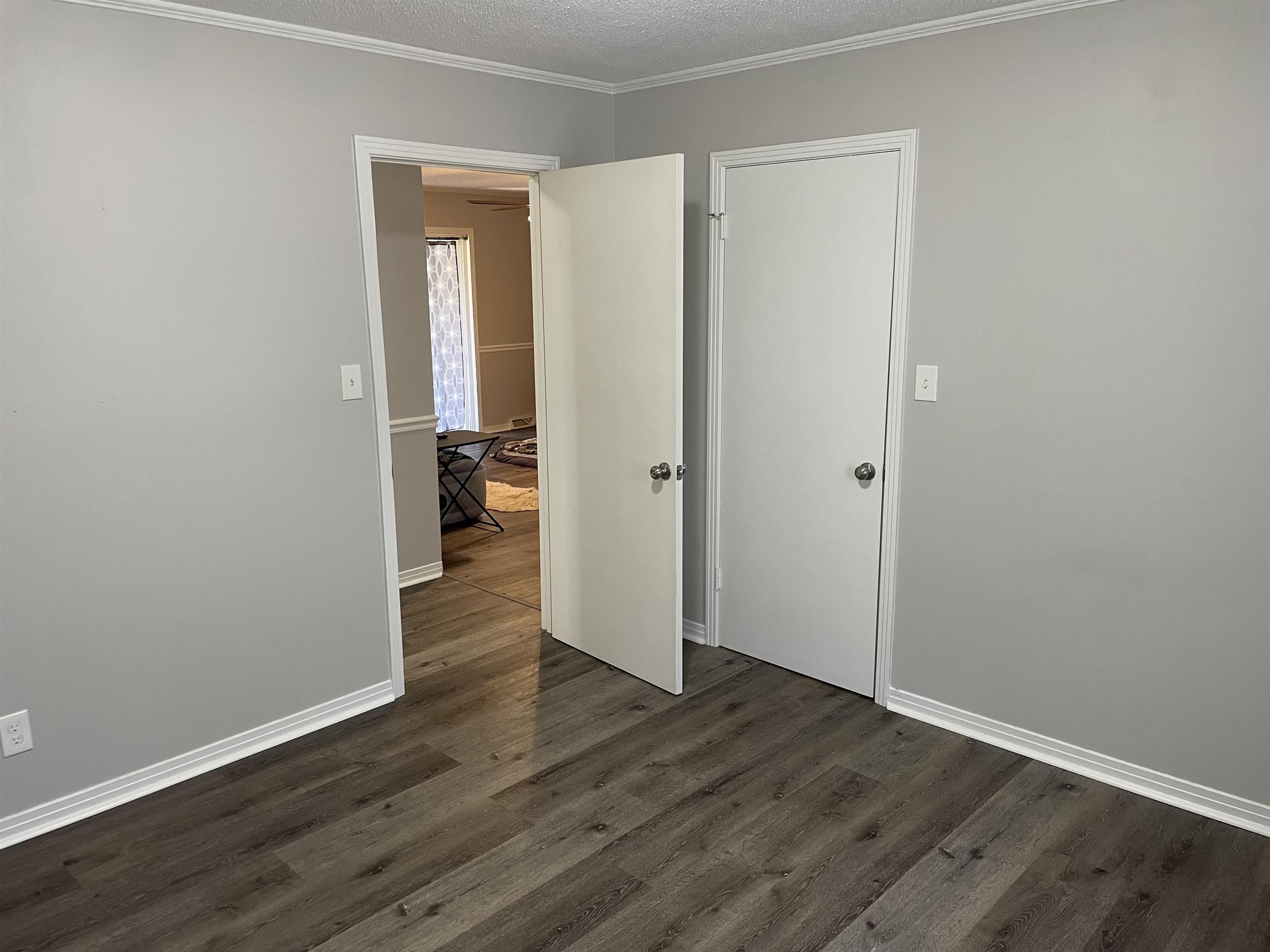 235 Paine Road Savannah, TN 38372 - Photo 14 of 28 an empty room with wooden floor & closet