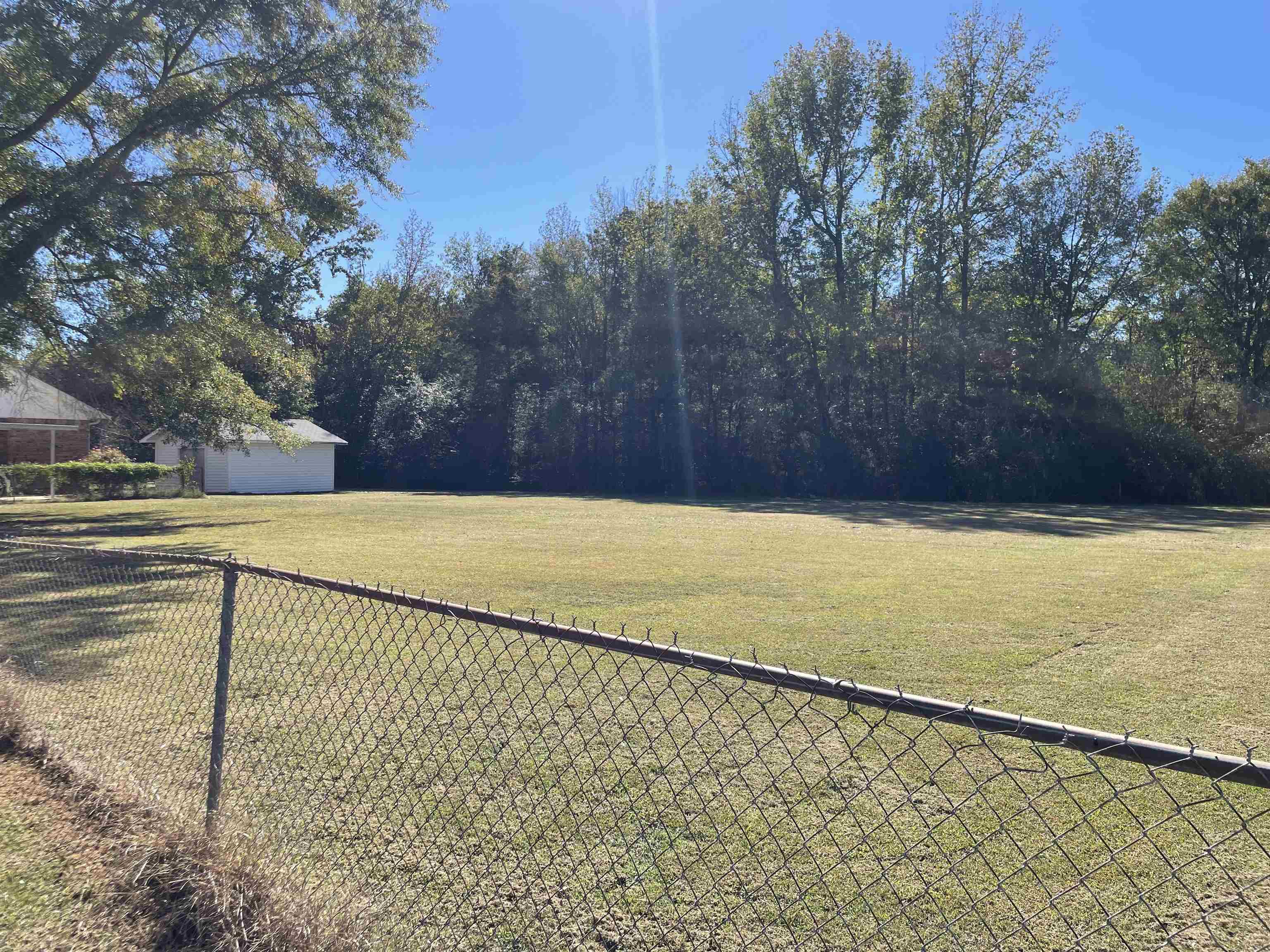 235 Paine Road Savannah, TN 38372 - Photo 26 of 28 a view of an outdoor space and a yard