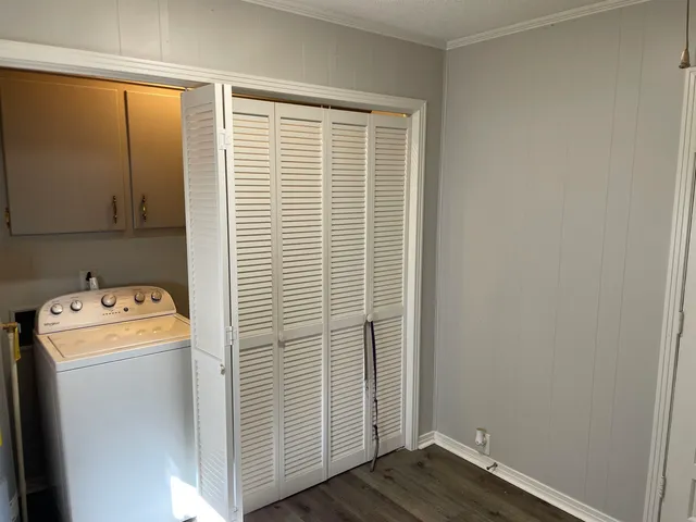 a view of storage and utility room with a utility room