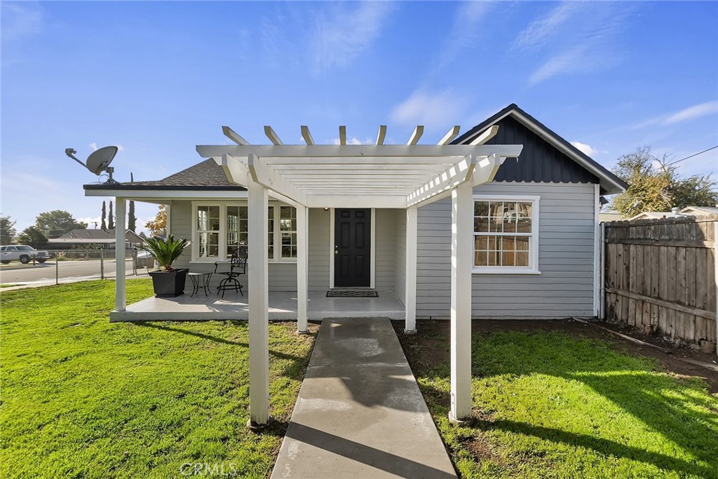 12148 Adams Street Yucaipa, CA 92399 - Photo 1 of 1 a view of a house with backyard and porch