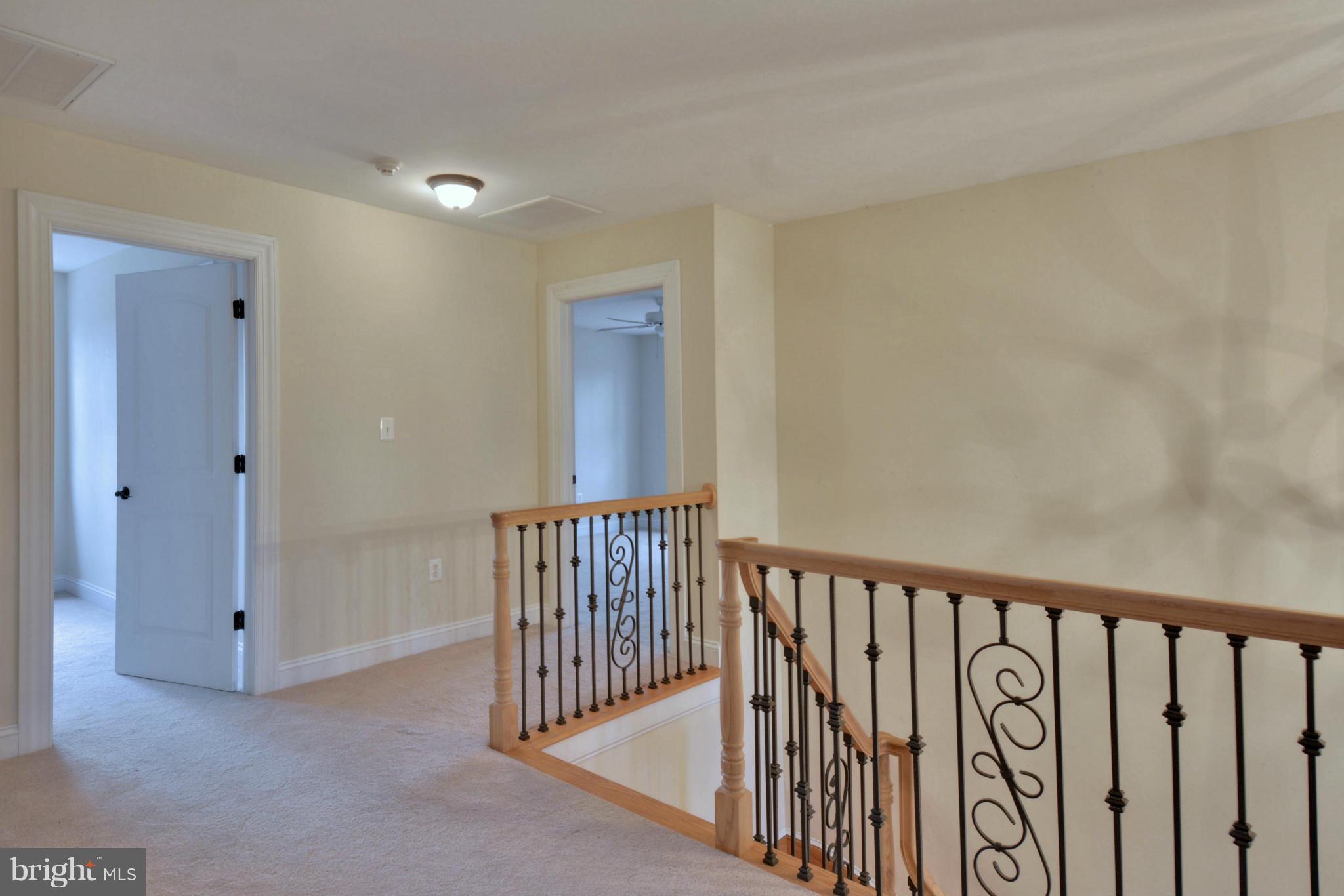 4985 Bayside Road Chesapeake Beach, MD 20732 - Photo 16 of 27 Upper Hallway