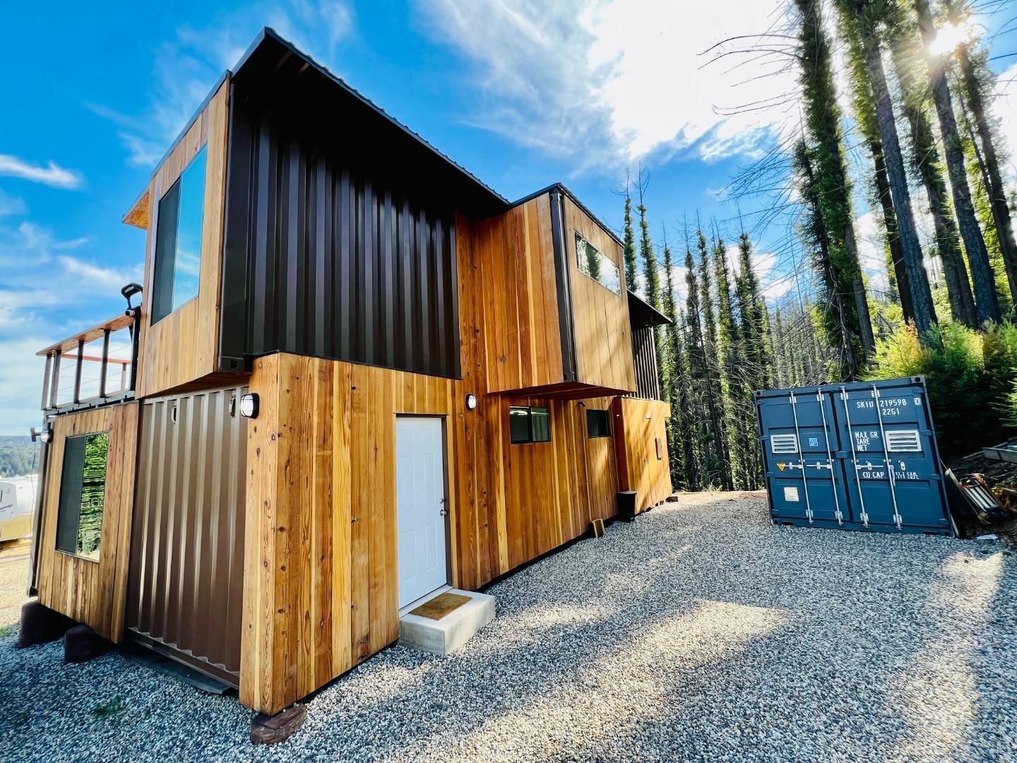 518 Container Way Boulder Creek, CA 95006 - Photo 13 of 33 a view of a house with wooden floor and fence
