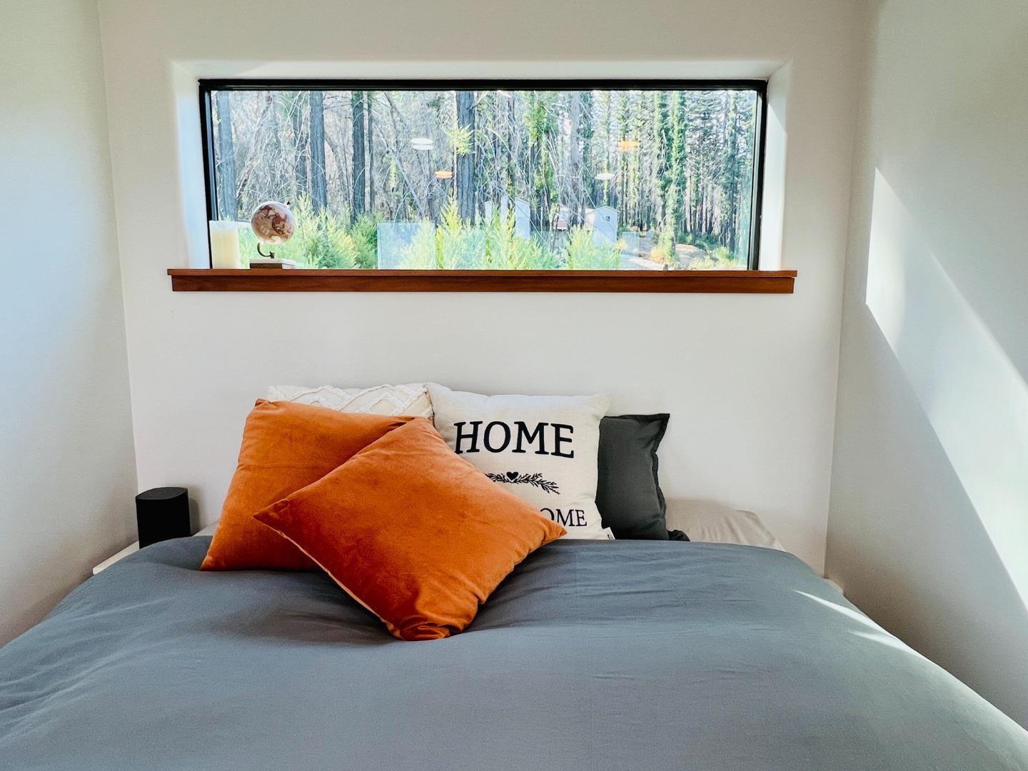 518 Container Way Boulder Creek, CA 95006 - Photo 21 of 33 a bedroom with a bed and window