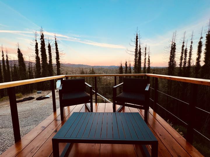 518 Container Way Boulder Creek, CA 95006 - Photo 29 of 33 a view of a balcony with chairs and wooden floor