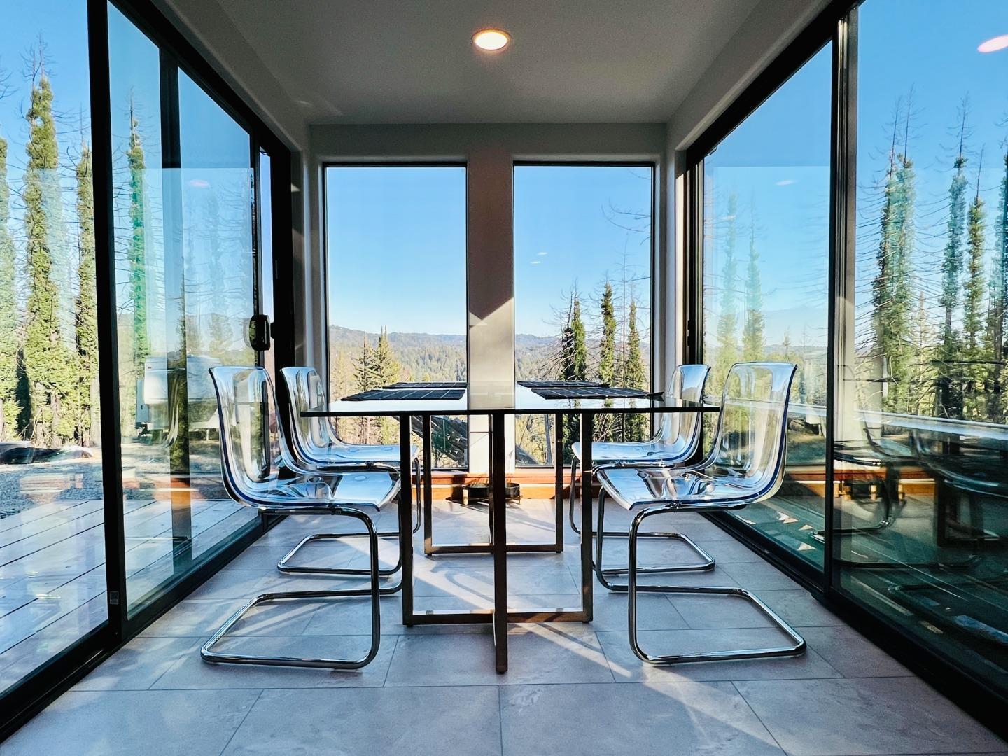 518 Container Way Boulder Creek, CA 95006 - Photo 5 of 33 a view of a balcony with chairs and wooden floor